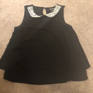 Sleeveless black top